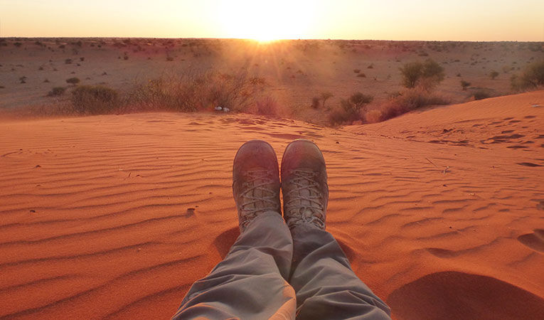 Shot of persons shoes in the Namib desert