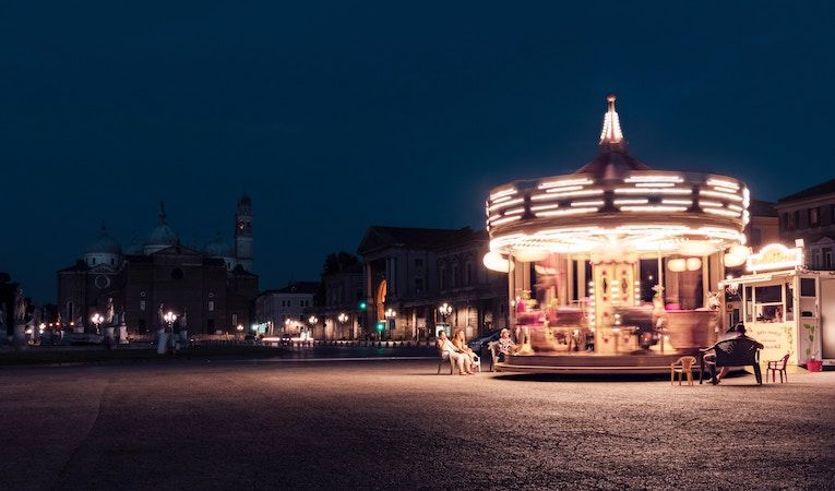 Lit up merry-go-round on the square in Padova, Italy 