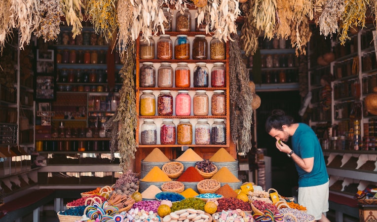 person in a moroccan spice market